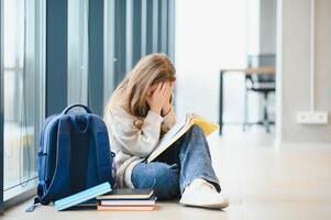 A Unhappy depress Pre teen girl at school photo