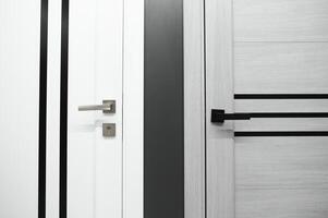 Doors are sold at a hardware store. Choosing doors for the house close-up. Interior renovation concept photo