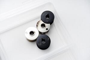 Spools for sewing machines. A spool of thread. photo