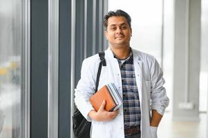 Portrait of a young doctor student studying photo