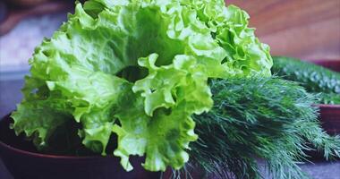 Spring salad. Home kitchen. Spring salad. Dill, cucumbers, lettuce video