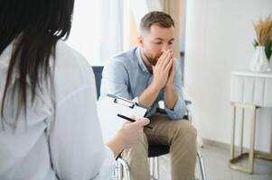 Patient visiting psychotherapist to deal with consequences photo