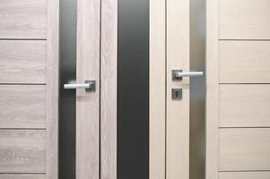 Doors are sold at a hardware store. Choosing doors for the house close-up. Interior renovation concept photo