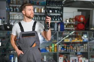 sales consultant in a car parts and accessories store photo