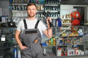 Smiling Salesman Auto Parts Store photo