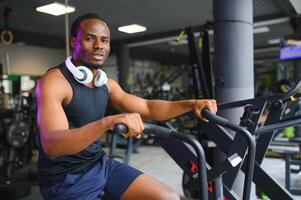 healthy men on gym bike photo