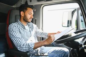 Portrait of a indian truck driver. photo