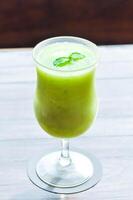fruit juice or apple juice , apple smoothie or fruit smoothie or green apple smoothie photo