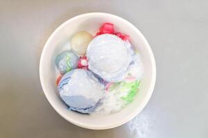 ice cream or Butterfly pea ice cream , Blue pea ice cream and sweetmeat or Thai dessert photo