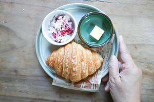 croissant , French croissant or French bread with butter and dip photo