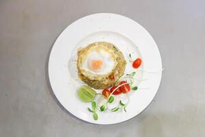 stir-fried rice, stir fried rice or fried rice with sunny side up egg or fried egg photo