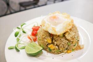 stir-fried rice, stir fried rice or fried rice with sunny side up egg or fried egg photo
