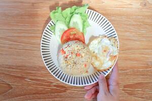 stir fried rice or fried rice with sunny side up egg photo