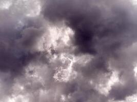 White fluffy cumulus clouds in the summer sky, natural clouds background photo