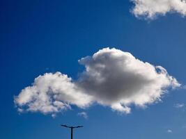 White fluffy clouds in the sky background. Cumulus clouds photo