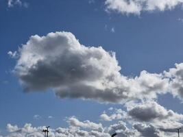 White fluffy clouds in the sky background. Cumulus clouds photo