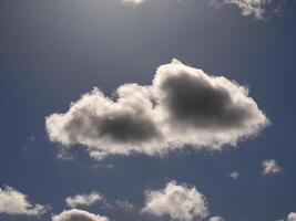 White fluffy clouds in the sky background. Cumulus clouds photo