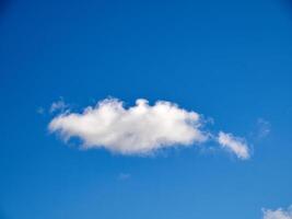 White fluffy clouds in the sky background. Cumulus clouds photo