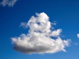 White fluffy clouds in the sky background. Cumulus clouds photo