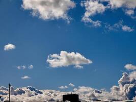 White fluffy clouds in the sky background. Cumulus clouds photo