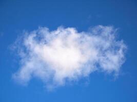 Cumulus clouds in the sky. Fluffy cloud shapes photo