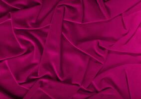 Red cloth pattern close view, textile material background photo