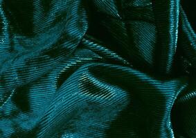 Green cloth pattern close view, textile material background photo