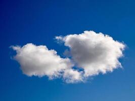 Cumulus clouds in the sky. Fluffy cloud shapes photo