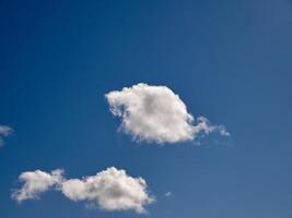 White fluffy clouds in the sky background. Cumulus clouds photo