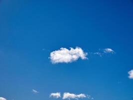 White fluffy clouds in the sky background. Cumulus clouds photo