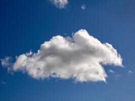 White fluffy clouds in the sky background. Cumulus clouds photo