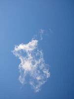 Cumulus clouds in the sky. Fluffy cloud shapes photo