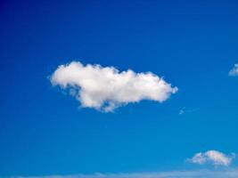 Cumulus clouds in the sky. Fluffy cloud shapes photo