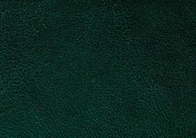 Green cloth pattern close view, textile material background photo