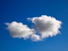 White fluffy clouds in the sky background. Cumulus clouds photo