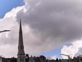 White fluffy cumulus clouds in the summer sky, natural clouds background photo