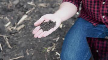 Farmer hand with fertile soil. Agriculture concept video