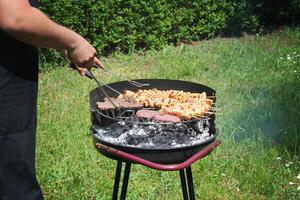 Barbecue Grilled meat on the BBQ grill photo