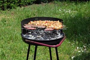 Barbecue Grilled meat on the BBQ grill photo