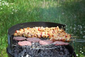 Barbecue Grilled meat on the BBQ grill photo