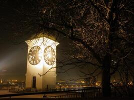 Old tower with clock in the Petrovaradin fortress near Novi Sad, Serbia photo