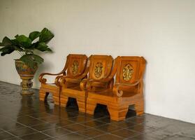 Old traditional wooden chair with java style. The photo is suitable to use for interior advertising content media.