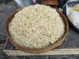 some of the goods offered by sellers at traditional market in Surakarta, Indonesia photo