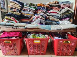 low angle view of household clothes arranged in a pile photo