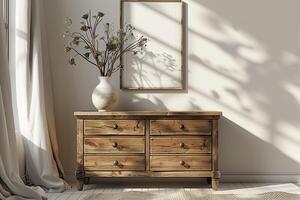 Vintage wooden chest of drawers with a porcelain vase, a dry branch and a poster on a white wall photo