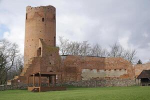 Czersk, Poland - March 24th, 2024 - Castle of Masovian Dukes - Tower, Defensive Wall and Courtyard photo