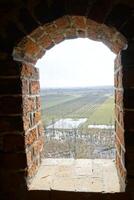 Czersk, Poland - March 24th, 2024 - View through the window at Masovian Dukes Castle photo