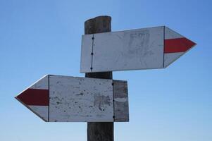 Wooden Signpost with Two Arrows photo