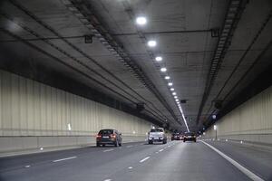 Warsaw, Poland - March 10th, 2024 - Driving a Car in Ursynow Tunnel photo