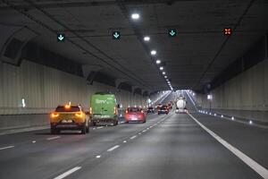 Warsaw, Poland - March 10th, 2024 - Driving a Car in Ursynow Tunnel photo